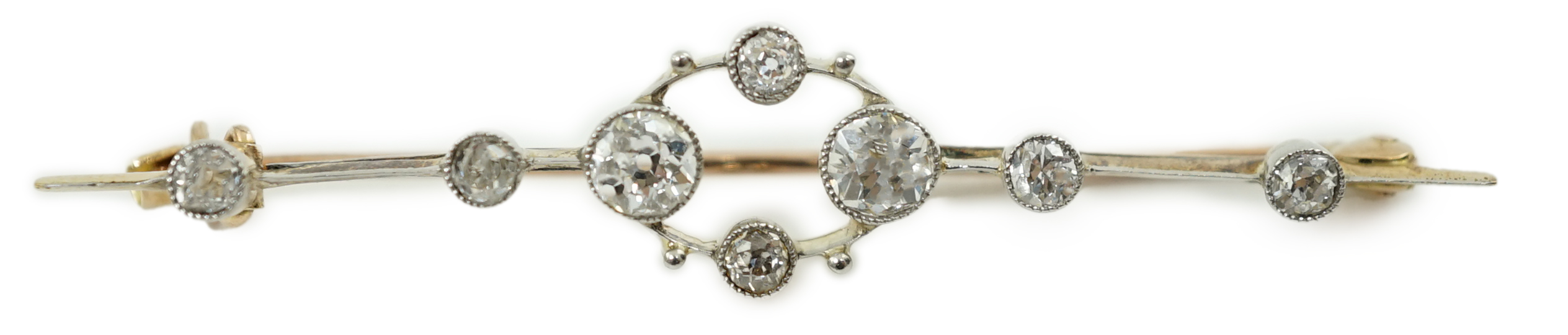 A Belle Epoque gold an diamond cluster set open work bar brooch